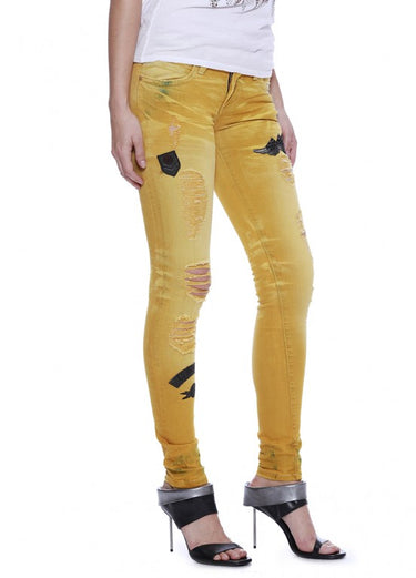 SKINNY WITH PATCHES IN F__UP YELLOW